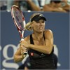 Caroline Wins Opening Match